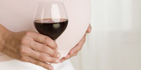 Pregnant Woman Drinking Wine