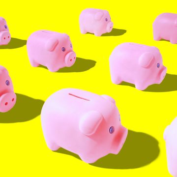 piggy banks on yellow background
