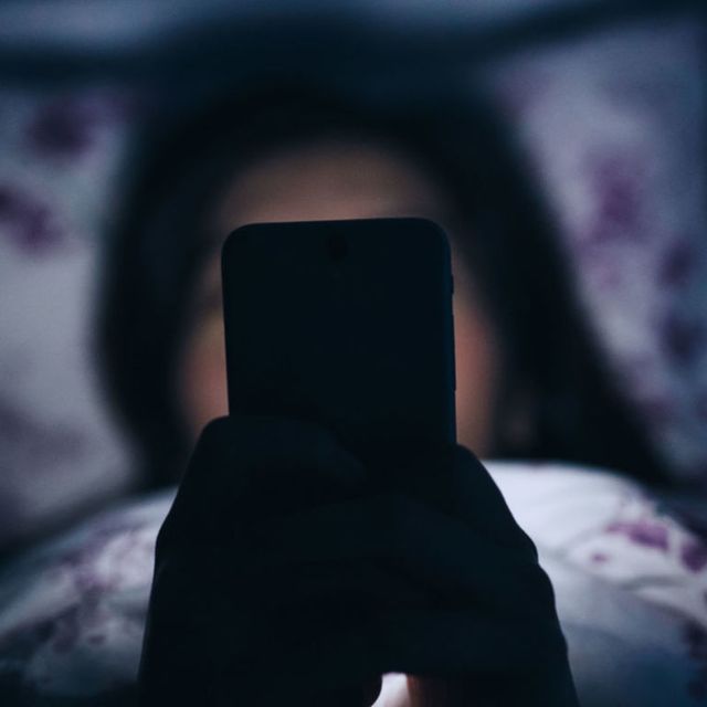 Phone in Bed