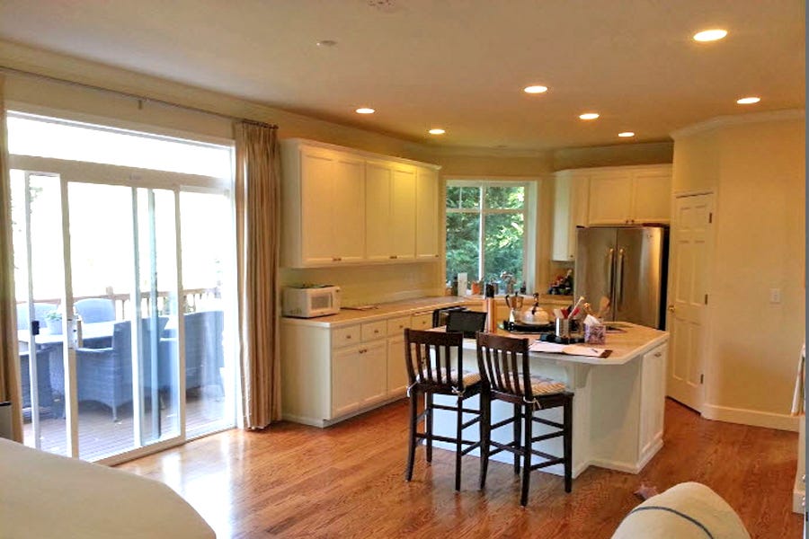Wood, Floor, Lighting, Interior design, Room, Flooring, Property, Cupboard, Ceiling, Countertop, 