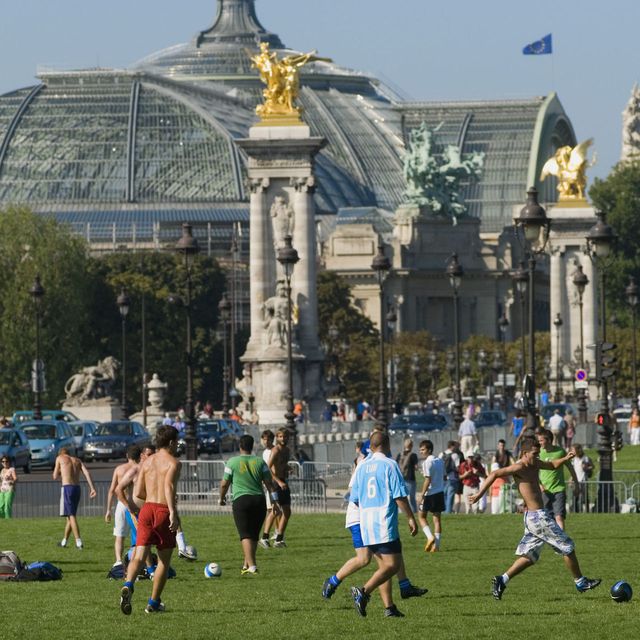 boys playing soccer in paris