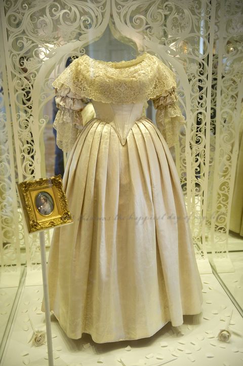 A dress worn by Britain's Queen Victoria on her wedding day to Prince Albert in 1840 is pictured in Kensington Palace in central London, on March 20, 2012, during a photocall to showcase a GBP12m (14.4m euros/19m USD) restoration of the historic palace. The restoration also features an exhibition of dresses worn by Diana, Princess of Wales. AFP PHOTO/MIGUEL MEDINA (Photo credit should read MIGUEL MEDINA/AFP/Getty Images)