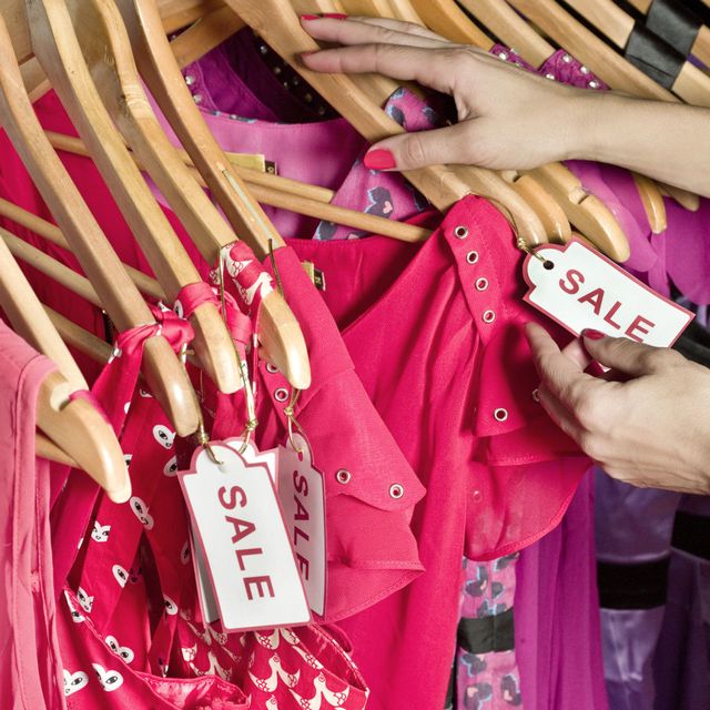 pink shirts for sale in a retail store