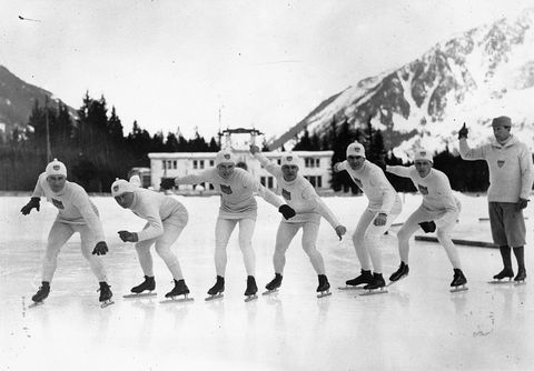 Skating, Sports, Ice skating, Team, Ice rink, Recreation, Team sport, Sports equipment, Black-and-white, Winter sport, 