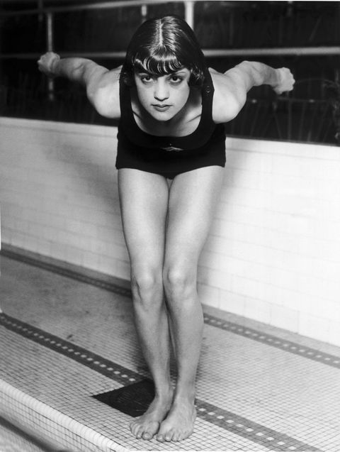 <p>U.S. swimmer Jane Fauntz ready to plunge into the pool in Chicago, 1928. At this time, women's swimsuits are becoming more streamlined for water sports, and females are <a href="http://visforvintage.net/2012/08/03/olympics-sportswear-a-complete-history/" target="_blank">no longer prohibited</a> from the sport for showing their legs (like they were in the 1908 Stockholm Olympics). </p>