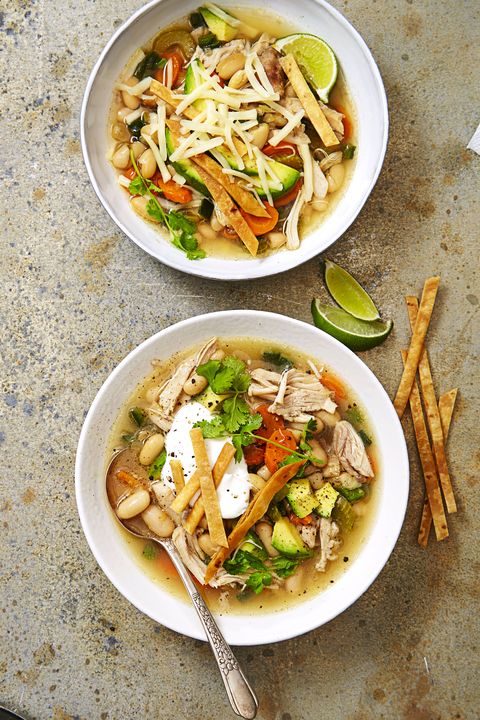 slow cooker tex mex chicken soup in white bowls
