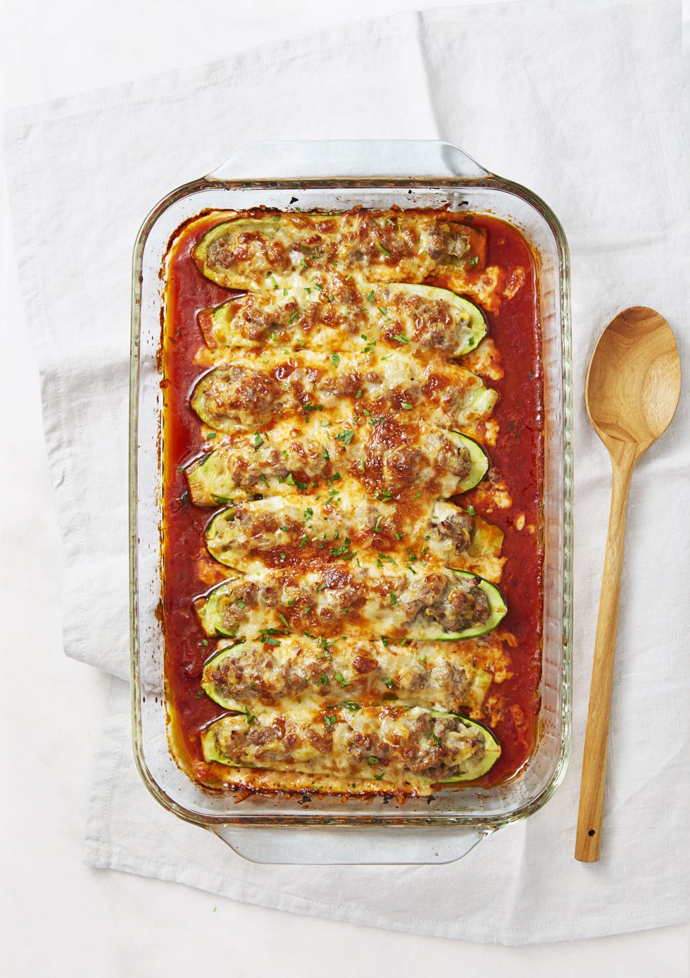 sausage stuffed zucchini boats in red sauce