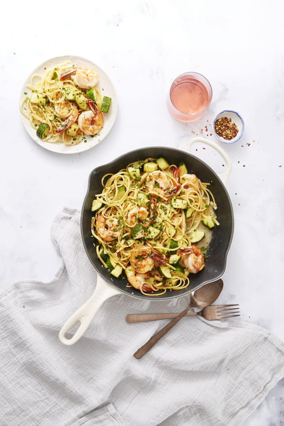 shrimp and zucchini scampi in a cast iron