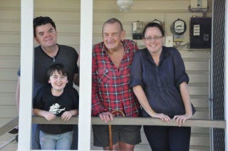 Robert, his father, wife and daughter