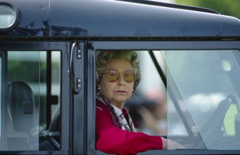 Queen Elizabeth driving a Land Rover