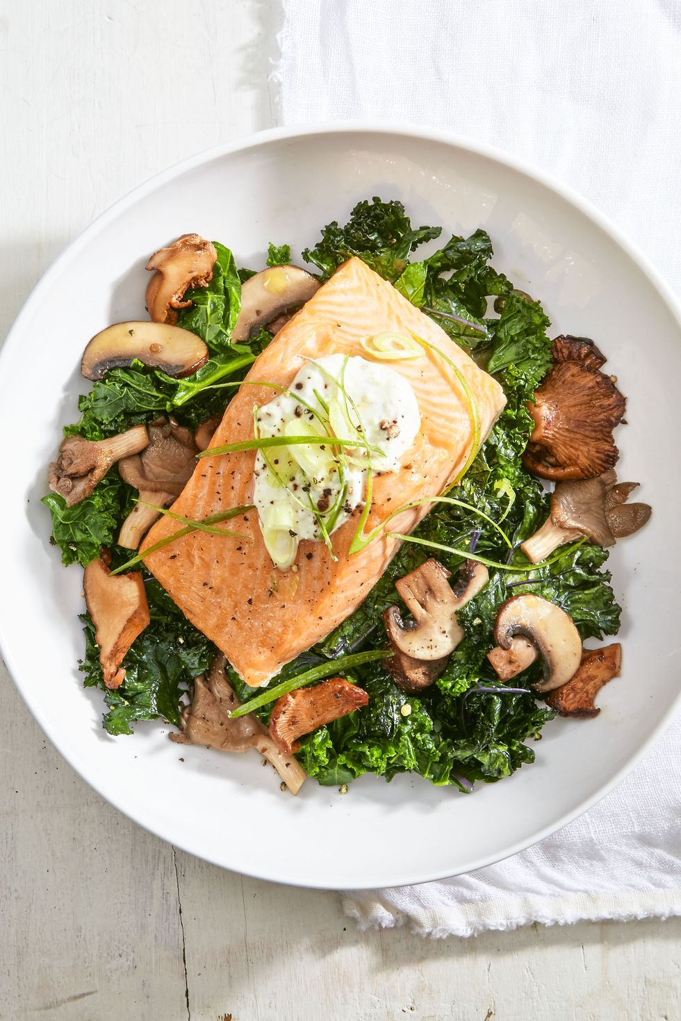 healthy salmon dinner sauteed kale and mushrooms