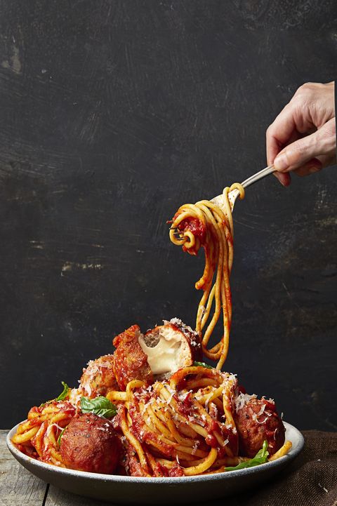 mozzarella stuffed turkey meatballs served with spaghetti