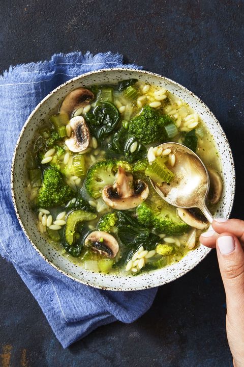 soup with mushroom, broccoli, and orzo in a bowl