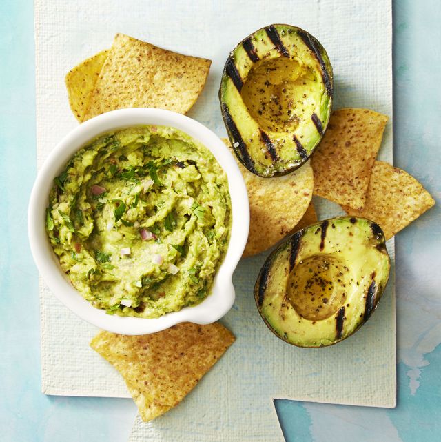 smoky guacamole with charred avocado and chips on the side