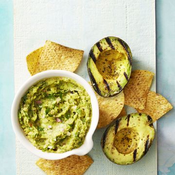 smoky guacamole with charred avocado and chips on the side