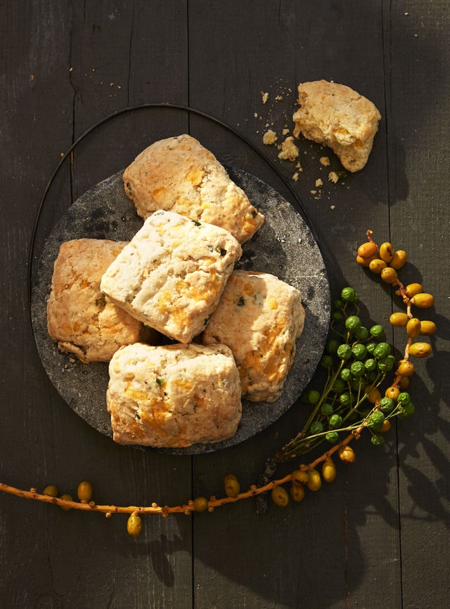 fluffy apple cheddar biscuits on a gray plate