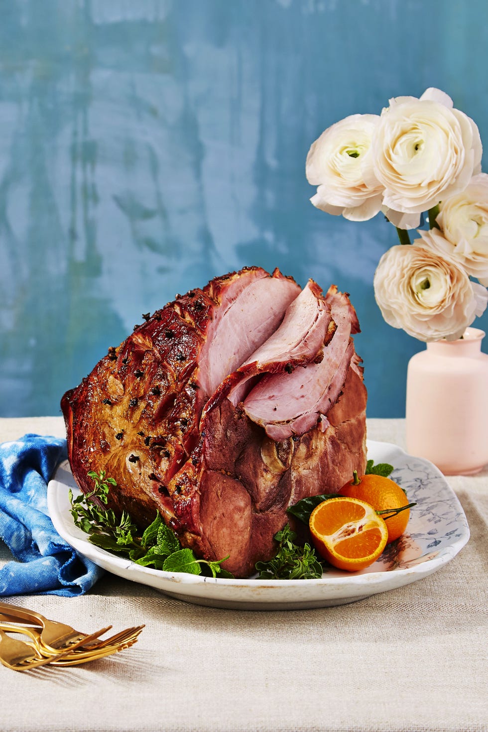 baked ham with root beer glaze served on a decorative platter