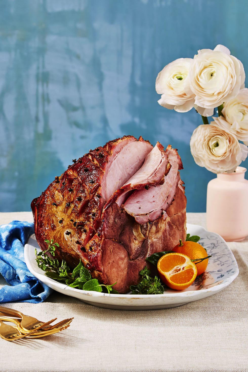 baked ham with root beer glaze served on a decorative platter