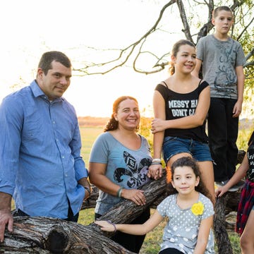 Hair, Face, Smile, People, Social group, Leisure, People in nature, Youth, Family, Crocodile, 