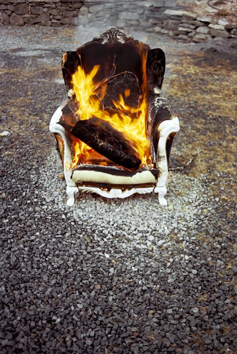burning armchair outside