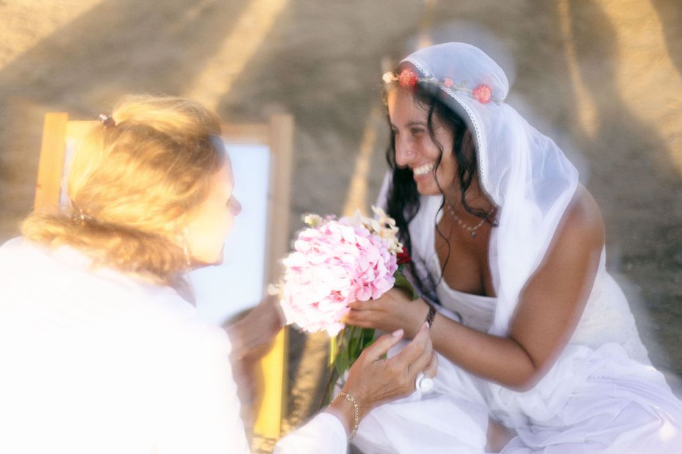 Petal, Pink, Bridal clothing, Headgear, Dress, Bridal veil, Bouquet, Fashion, Bride, Ceremony, 