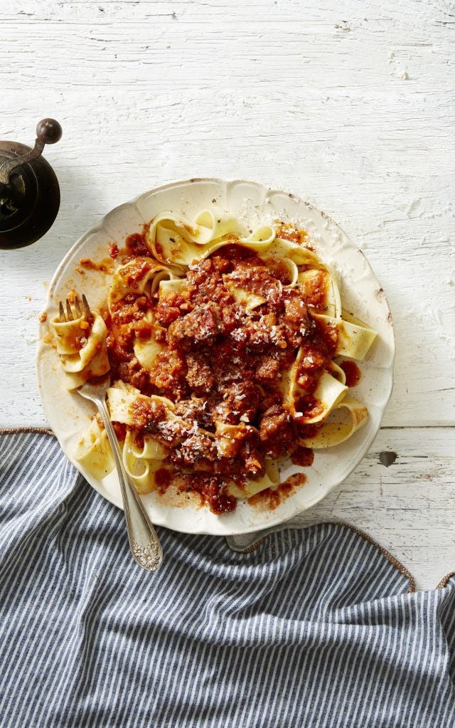 ragu pasta on a white plate