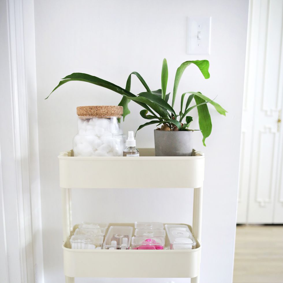 bathroom organization ideas, white cart that stores towels and toiletries