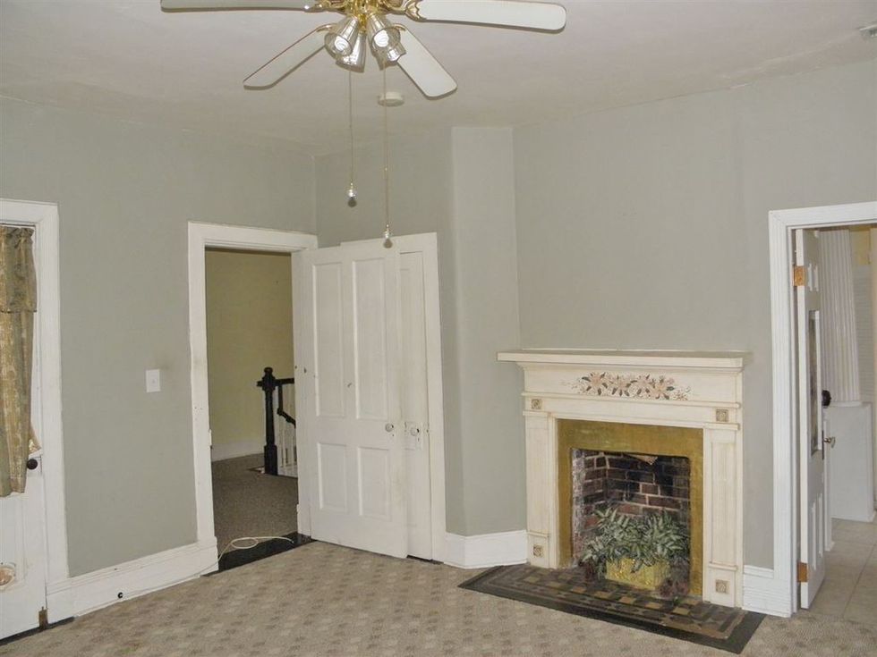 Ceiling fan, Room, Ceiling, Property, Mechanical fan, Molding, Wall, Floor, House, Interior design, 