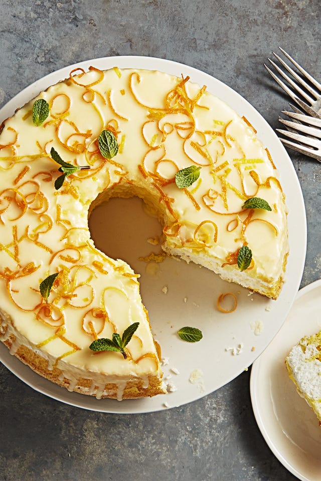 a round orange citrus cake with zest as garnish