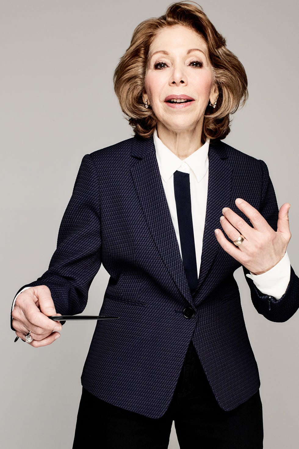 <p><strong data-redactor-tag="strong"><a href="http://www.victoriabond.com/" target="_blank" data-tracking-id="recirc-text-link">Victoria Bond</a>, 71, composer, conductor, and producer of the Cutting Edge Concerts New Music Festival in New York</strong><span class="redactor-invisible-space" data-verified="redactor" data-redactor-tag="span" data-redactor-class="redactor-invisible-space"></span><br></p><p>"My profession in music is an emotional roller coaster, and there was a time when I'd fall into a black hole because of critics, but over the years I've come to have an inner stability. I like being the age I am — I'd never want to be 20 again! I keep doing what I do, and I'm busier than ever." &nbsp;</p><p><strong data-redactor-tag="strong" data-verified="redactor"><em data-redactor-tag="em" data-verified="redactor">Wardrobe:</em><em data-redactor-tag="em" data-verified="redactor">&nbsp;</em></strong><span class="redactor-invisible-space" data-verified="redactor" data-redactor-tag="span" data-redactor-class="redactor-invisible-space"><em data-redactor-tag="em" data-verified="redactor"><a href="https://www.reiss.com/us/p/single-breasted-blazer-womens-isabella-in-navy/?q=isabella " target="_blank" data-tracking-id="recirc-text-link">Isabella Blazer</a>, REISS, $370;&nbsp;<a href="http://VinceCamuto.com " target="_blank" data-tracking-id="recirc-text-link">Roll-Tab Sleeve Blouse</a>, VINCE CAMUTO, $89</em></span></p>
