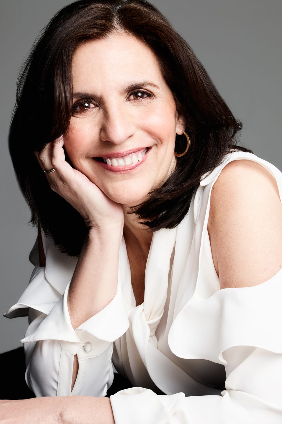 <p> <strong data-redactor-tag="strong"><a href="http://rjpalacio.com/" target="_blank" data-tracking-id="recirc-text-link">RJ Palacio</a>, 53, worldwide bestselling author of&nbsp;</strong><i data-redactor-tag="i"><strong data-redactor-tag="strong">Wonder</strong></i><span class="redactor-invisible-space" data-verified="redactor" data-redactor-tag="span" data-redactor-class="redactor-invisible-space"></span><br></p><p>"I'm the daughter of Latin-American immigrants, and I worked very hard to prove myself, to achieve, to validate the tough choices I know my parents made. I have also been blessed by good fortune, but it takes a lot of work to be this lucky. <i data-redactor-tag="i">Audentes Fortuna iuvat.</i> Fortune favors the bold."</p><p><em data-redactor-tag="em" data-verified="redactor"><strong data-redactor-tag="strong" data-verified="redactor">Wardrobe:</strong></em> <em data-redactor-tag="em" data-verified="redactor"><a href="https://www.anntaylor.com/bare-shoulder-blouse/430156?skuId=22582959&amp;defaultColor=9192&amp;colorExplode=false&amp;catid=cata000010 " target="_blank" data-tracking-id="recirc-text-link">Bare Shoulder Blouse</a>, ANN TAYLOR, $90</em></p>