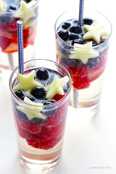 sangria with fresh strawberries, raspberries, blueberries, and green apple stars