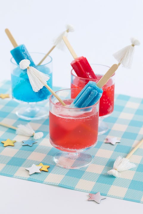 blue and red cocktails with popsicles in them