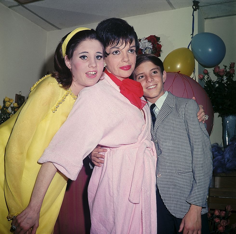 Judy Garland and children Lorna, 14, and Joey, 12, following a performance in 1967.