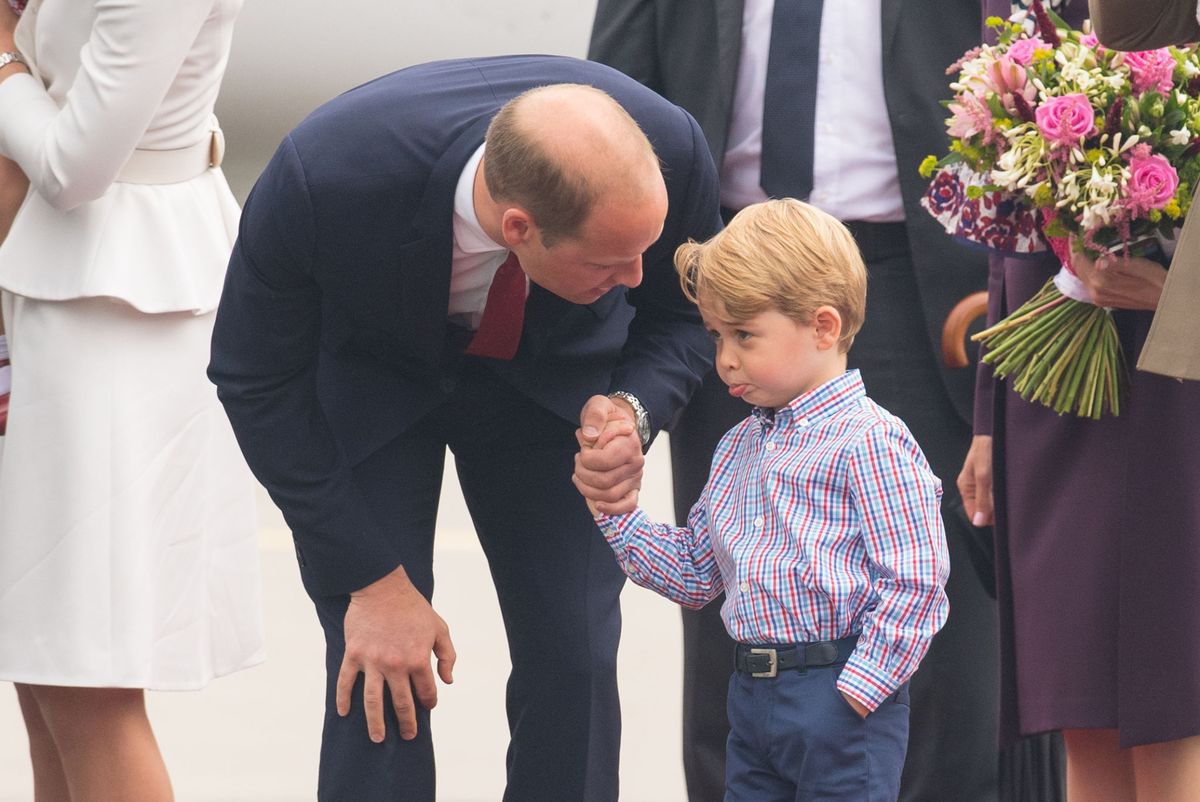 The Duke of Cambridge at Warsaw's Chopin Airport with Prince George at the start of their five-day tour of Poland and Germany