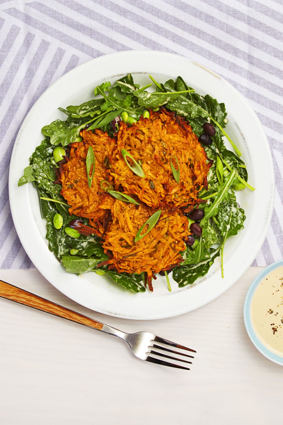 sweet potato cakes with kale and bean salad