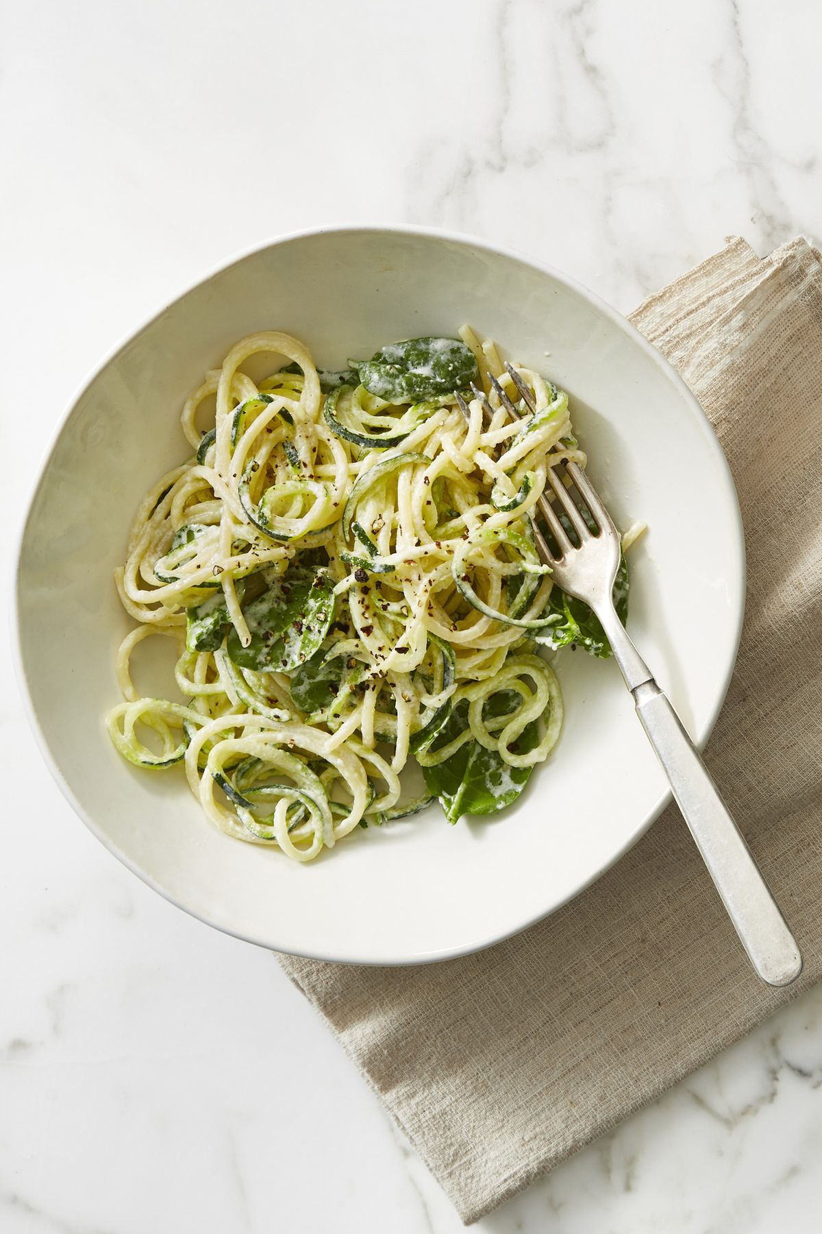 creamy spaghetti and zoodles on a plate