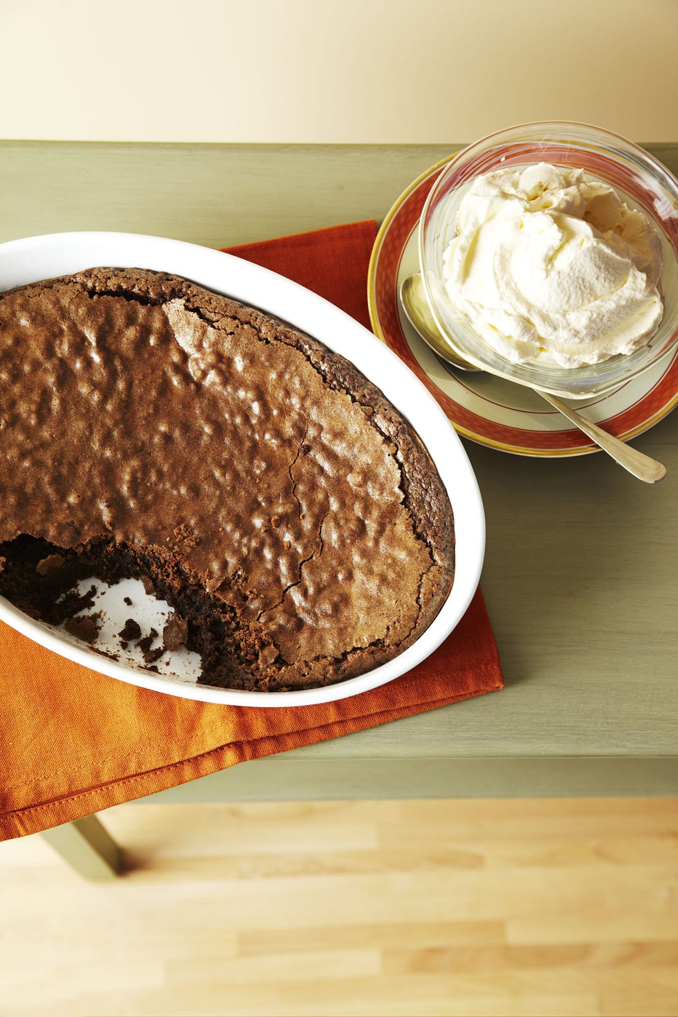 baked chocolate pudding in a white baking dish