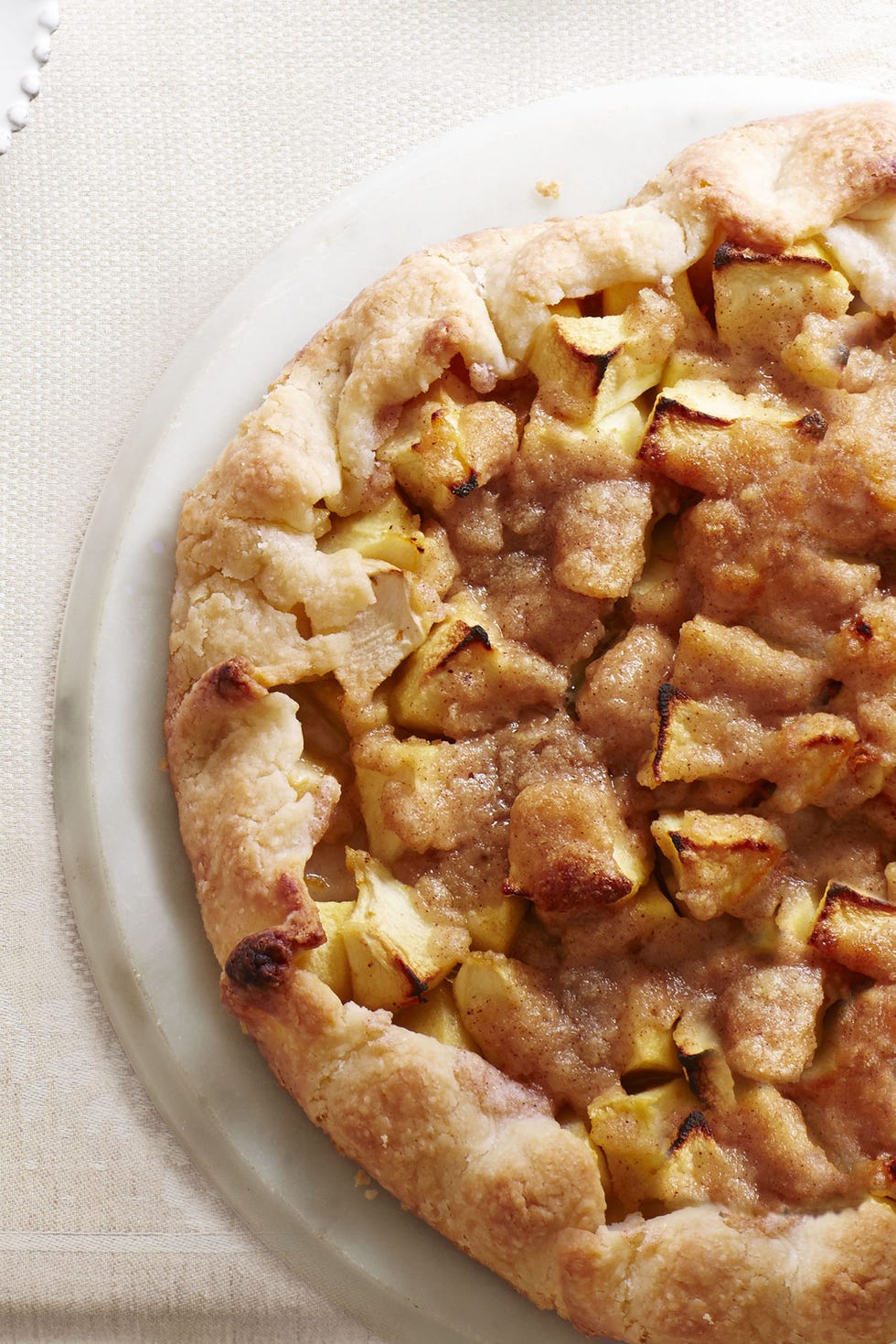 a close up of an apple crostata
