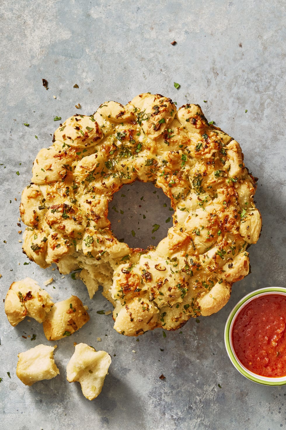 pull apart cheesy monkey bread with marinara sauce on the side