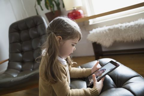 Child, Toddler, Technology, Electronic device, Gadget, Play, Sitting, Room, Couch, Reading, 