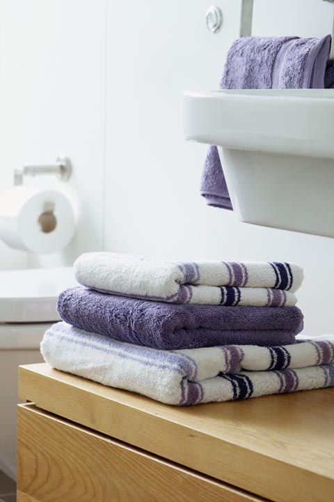 Towel, Purple, Room, Textile, Linens, Furniture, Interior design, Table, Blanket, 