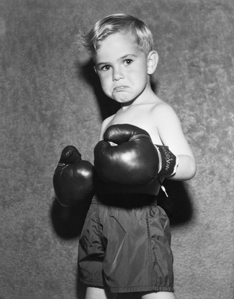 Boxing glove, Boxing, Boxing equipment, Sports equipment, Arm, Glove, Striking combat sports, Child, Contact sport, Combat sport, 