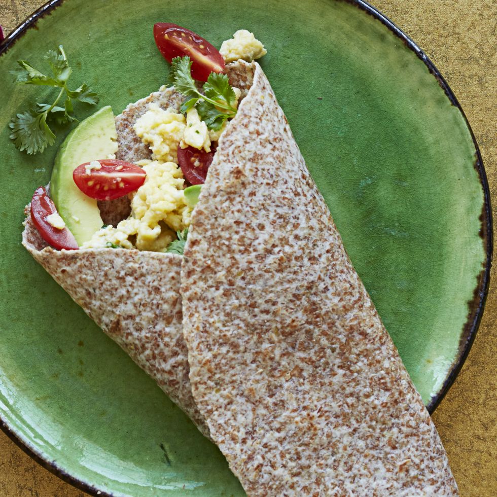 south of the border breakfast wrap on a green plate