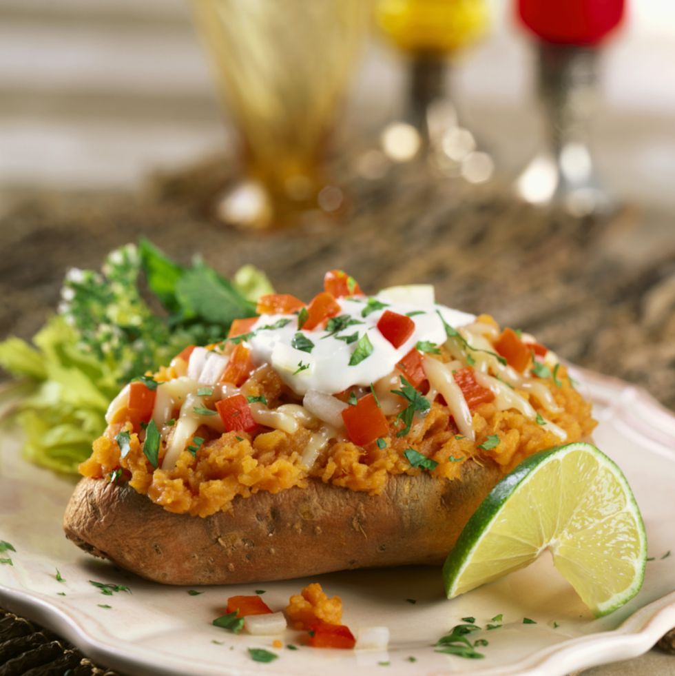 loaded sweet potato on a white plate