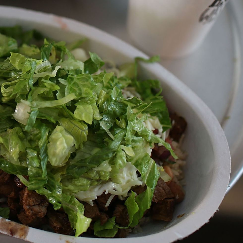 chipotle burrito bowl with lettuce and meat