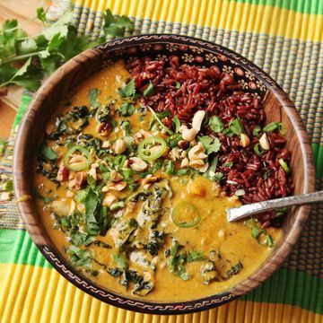 vegan peanut, sweet potato, and kale soup with coconut