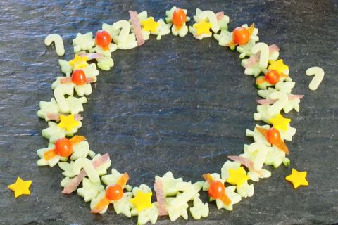 Lei, Wreath, Candy corn, Confectionery, Food, Dish, Plant, Flower, Candy, Cuisine, 