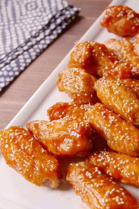 korean chicken wings with sesame seeds on top