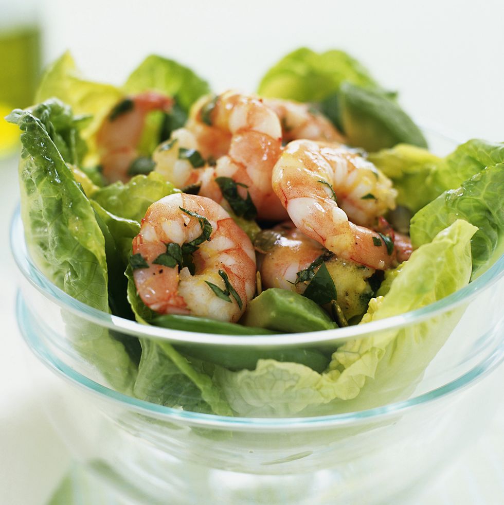 shrimp in lettuce cups in a glass bowl